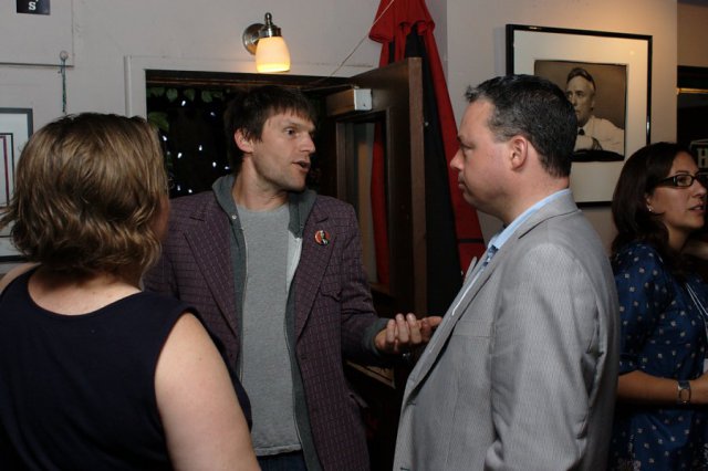 Kevin Beaulieu (Left): A familiar face to many, listening to one of our local mural artists