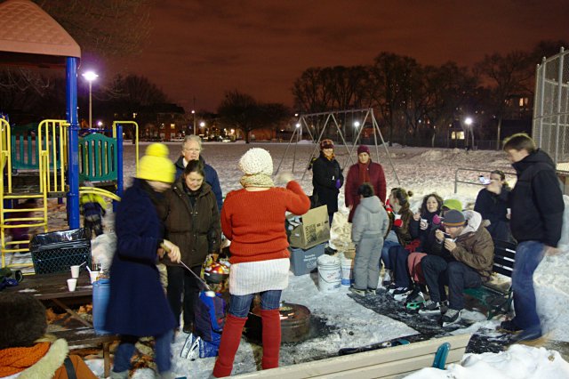 Campfire: People gathered around the campfire to get some tasty onion soup and marshmallows, and to take a break from skating.