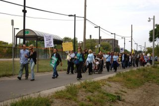  The Human Train on the West Toronto Railpath, passing GO Transit's Bloor Station.