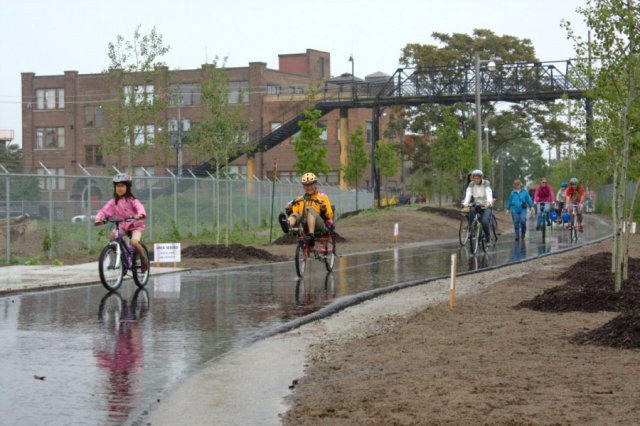  The rain came, just as the parade started heading north from Wallace Ave.