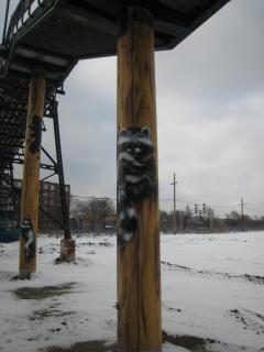  A painting of a raccoon climbing on the Wallace Ave. bridge.    Photo by Vic Gedris, December 31 2007.